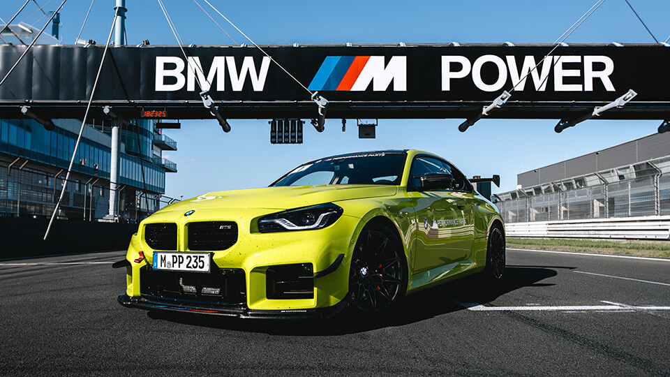 Front view of BMW M3 in garage