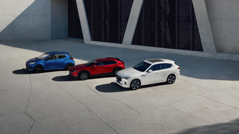 The Mazda range outside a modern building