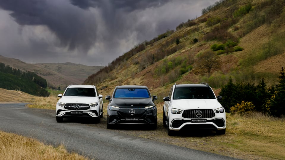 Front angled view of three Mercedes-Benz Vehicles