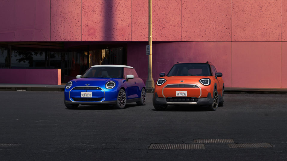 Front-on view of MINI Cooper Electric and MINI Aceman
