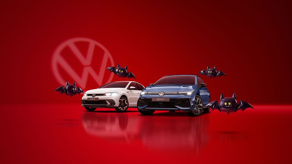Volkswagen Polo and Golf with bats flying around them and Volkswagen logo in background