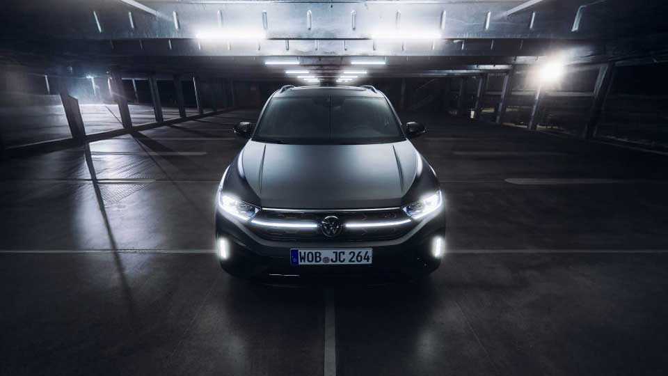 Front of a silver Volkswagen T-Roc in a car park